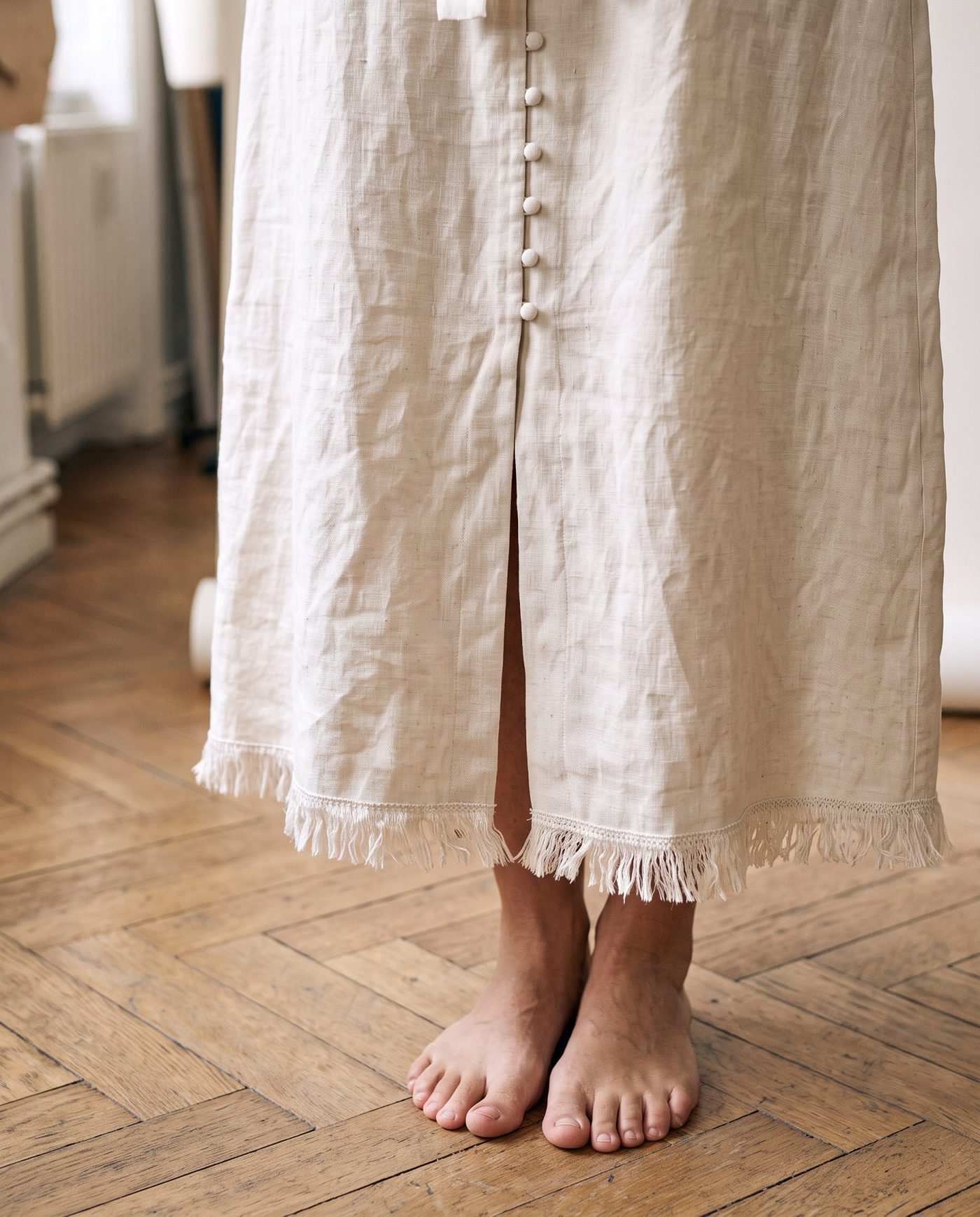 Détail de la robe Lisière : coupe et finitions en gros plan